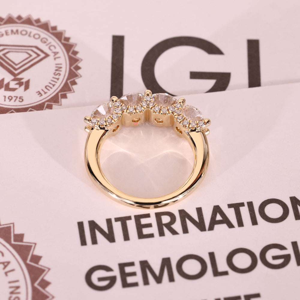 Round diamond wedding band with u prong setting.
