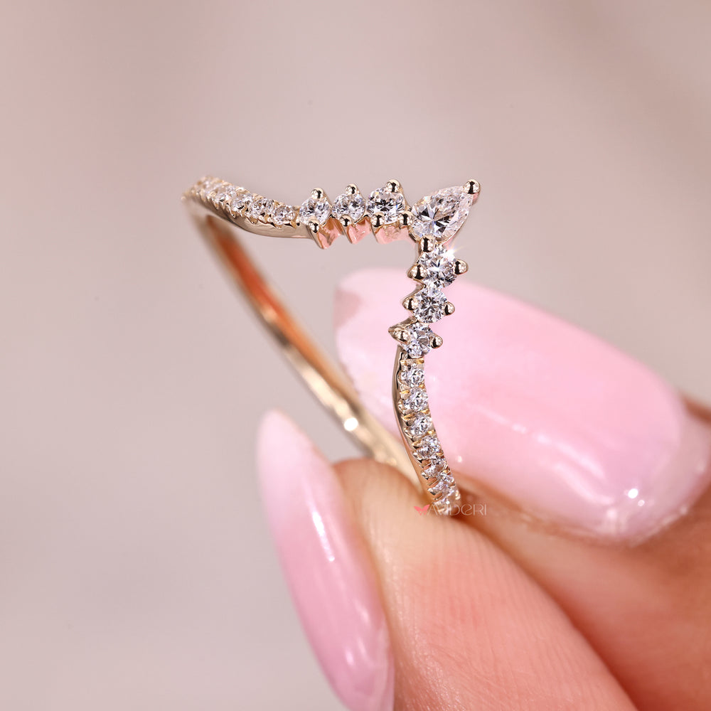 Diamond wedding band in chevron shape.