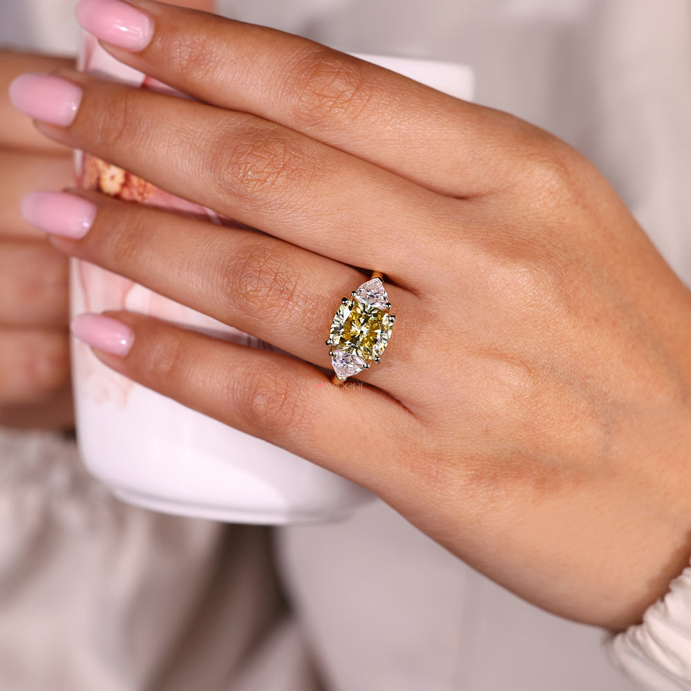 Canary yellow moissanite three stone ring handmade.
