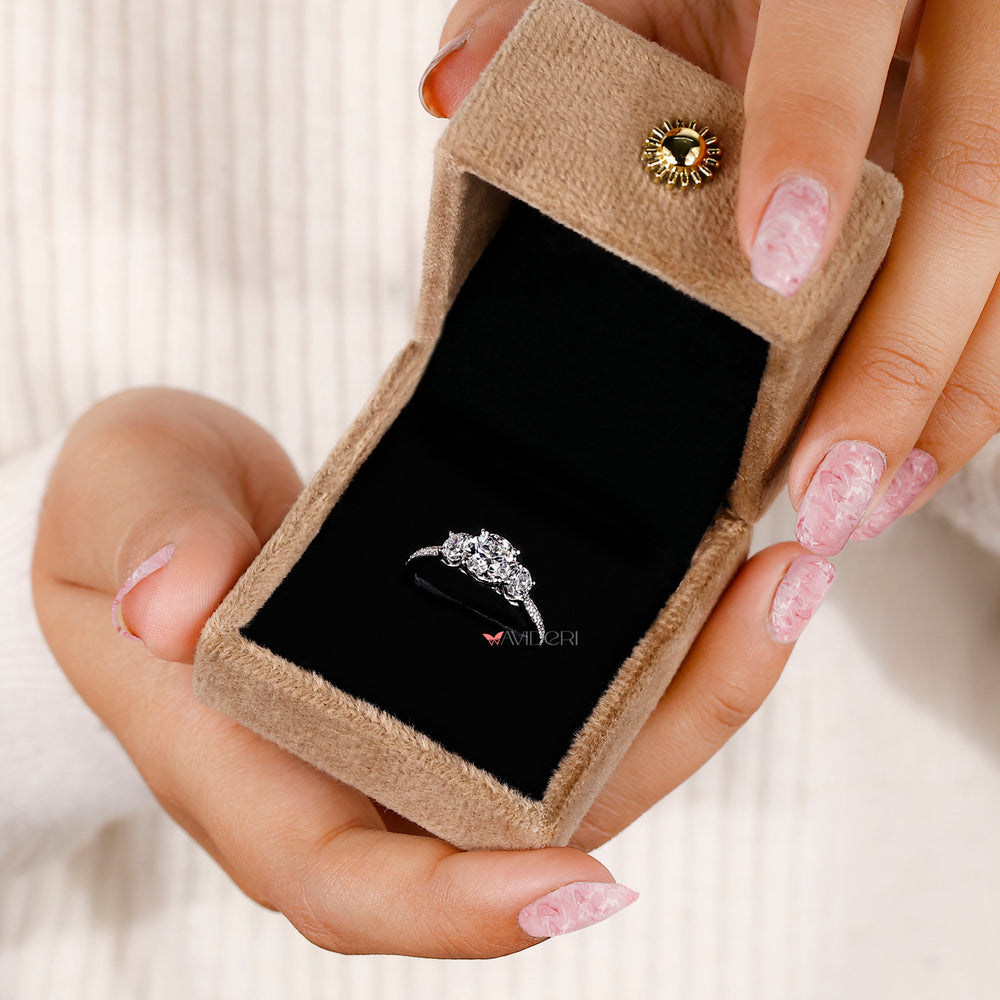 White gold engagement ring with three stone diamond ring.
