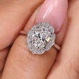 Oval Cut Halo Engagement Ring in a stunning white gold setting.