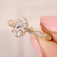 Art deco diamond ring featuring marquise and round side diamond accents.