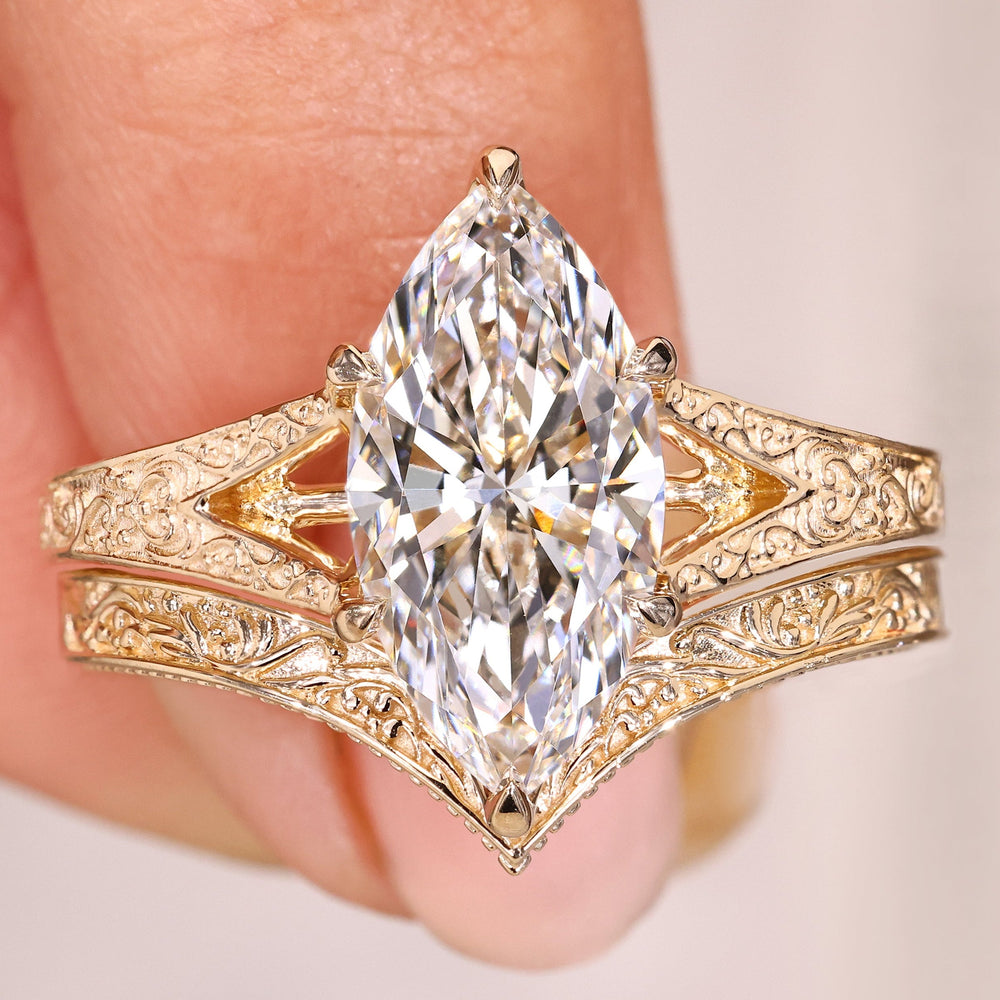 Vintage marquise ring with curved eternity band.

