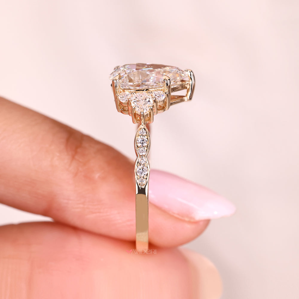 Vintage pear cut diamond ring pave style design.
