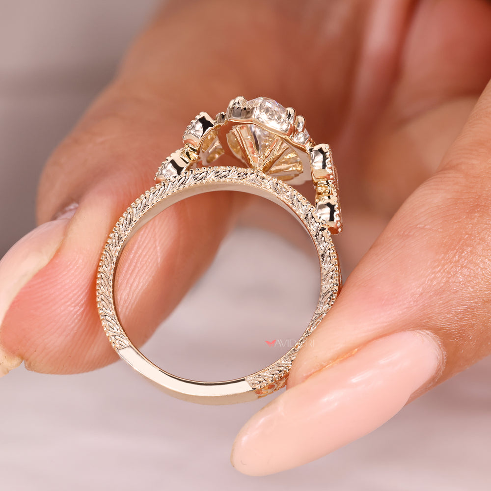 Marquise diamond engagement ring with art deco style details
