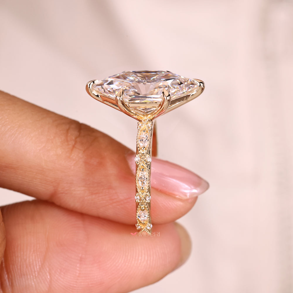 Marquise ring with six claw prong setting design.

