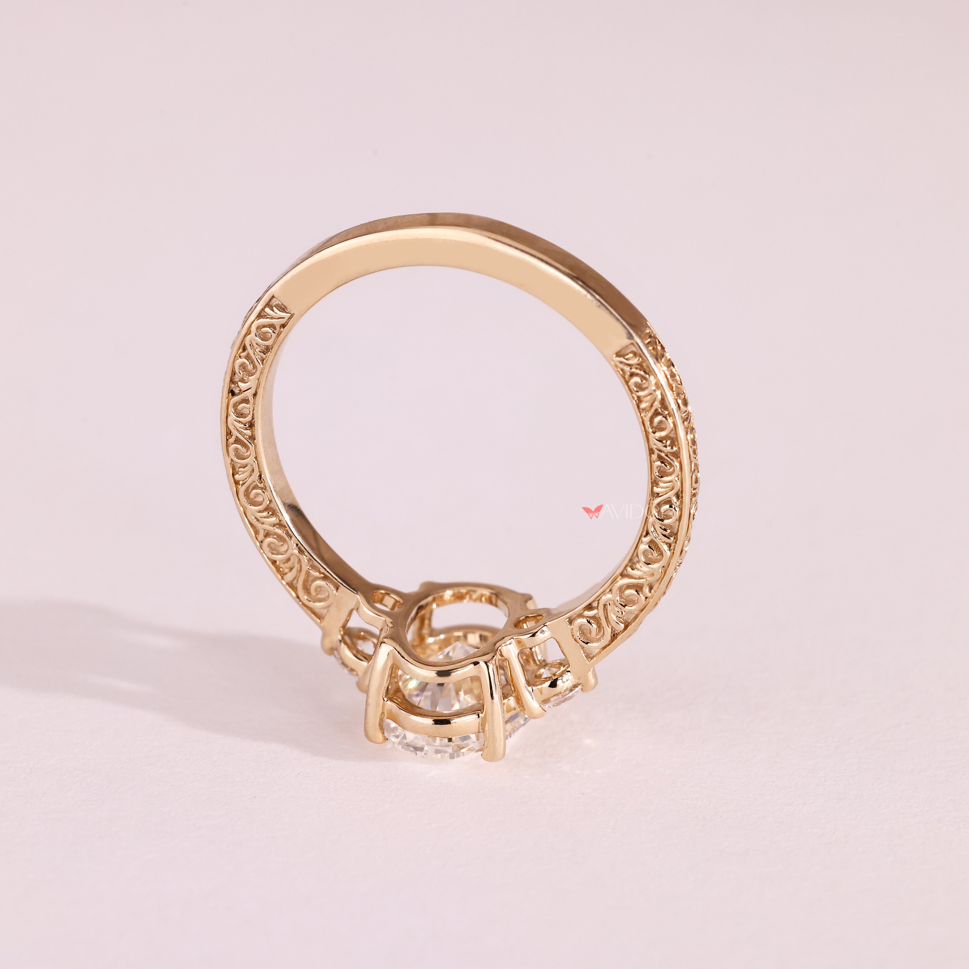 Avideri oval diamond ring with tapered shank and prongs
