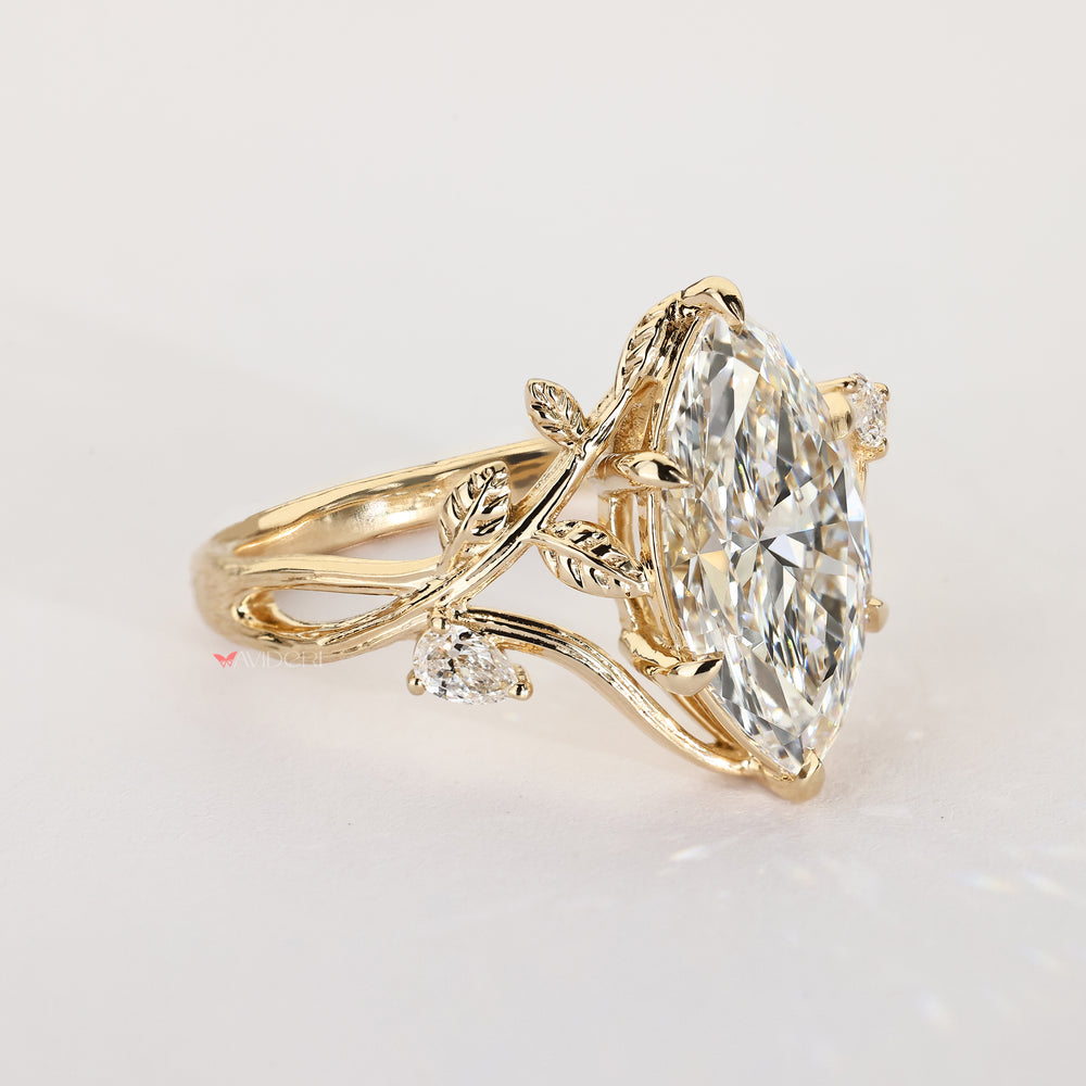 Nature inspired engagement ring with marquise center diamond design
