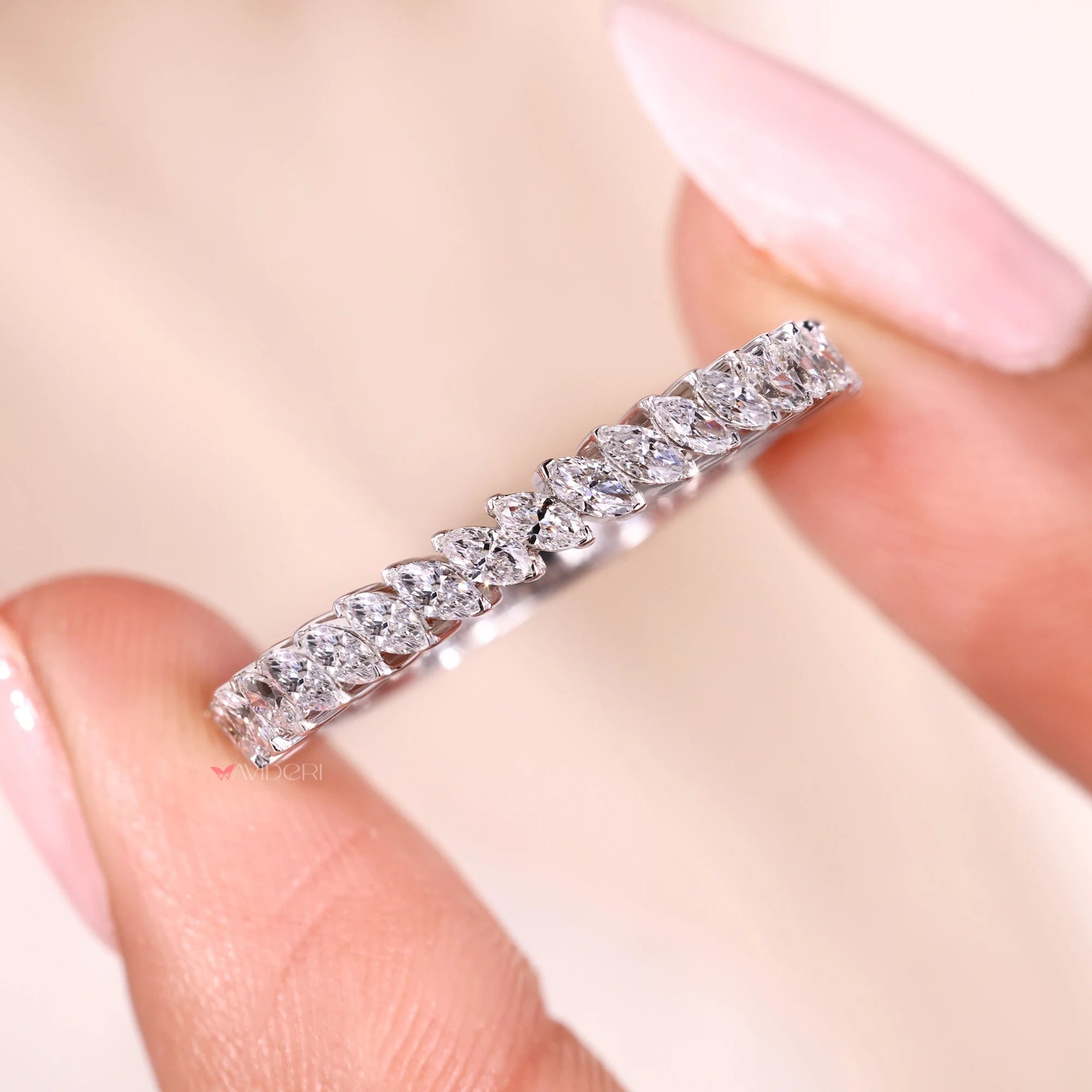 Marquise half eternity band with diamond half eternity band.
