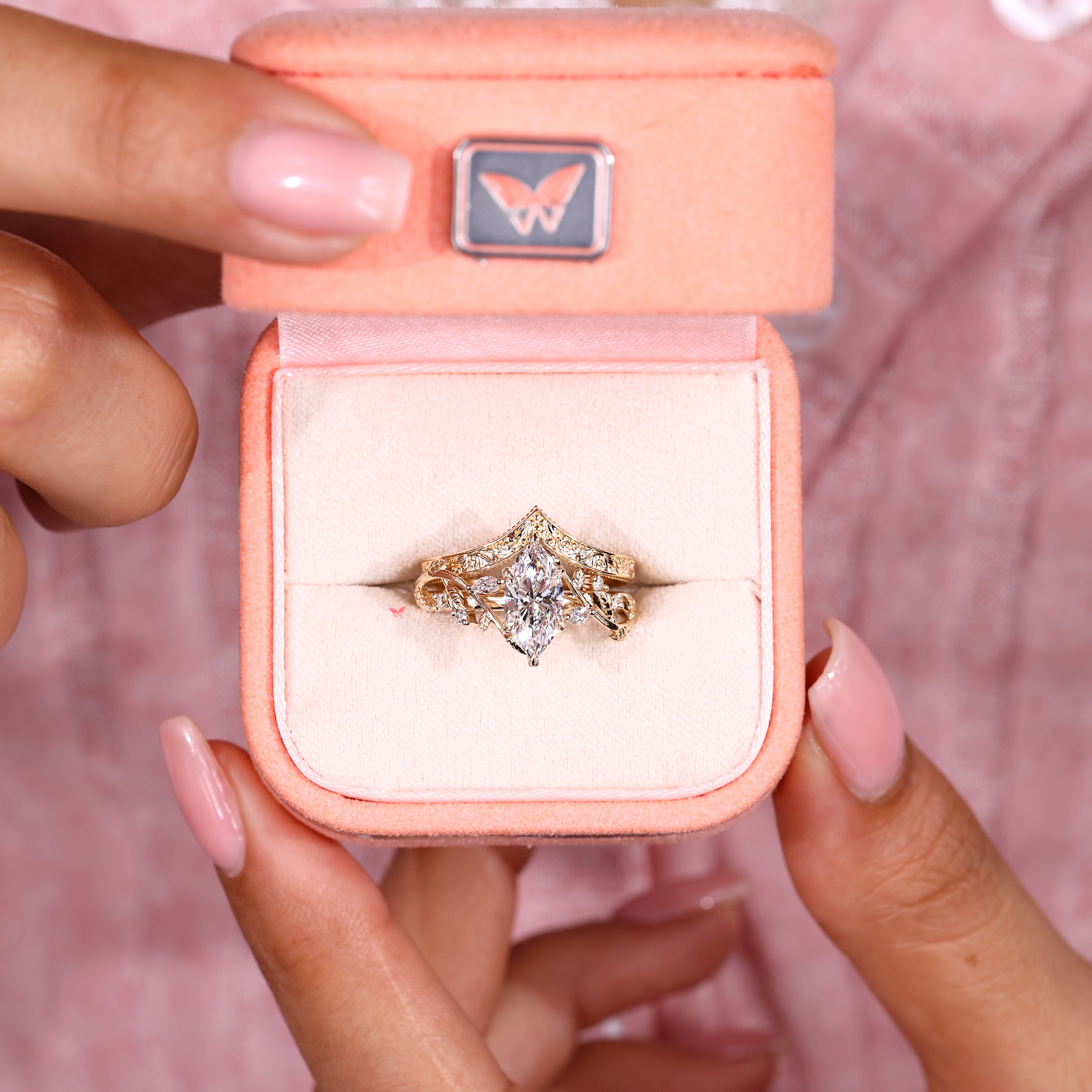 Marquise ring set with six leaf prong setting style
