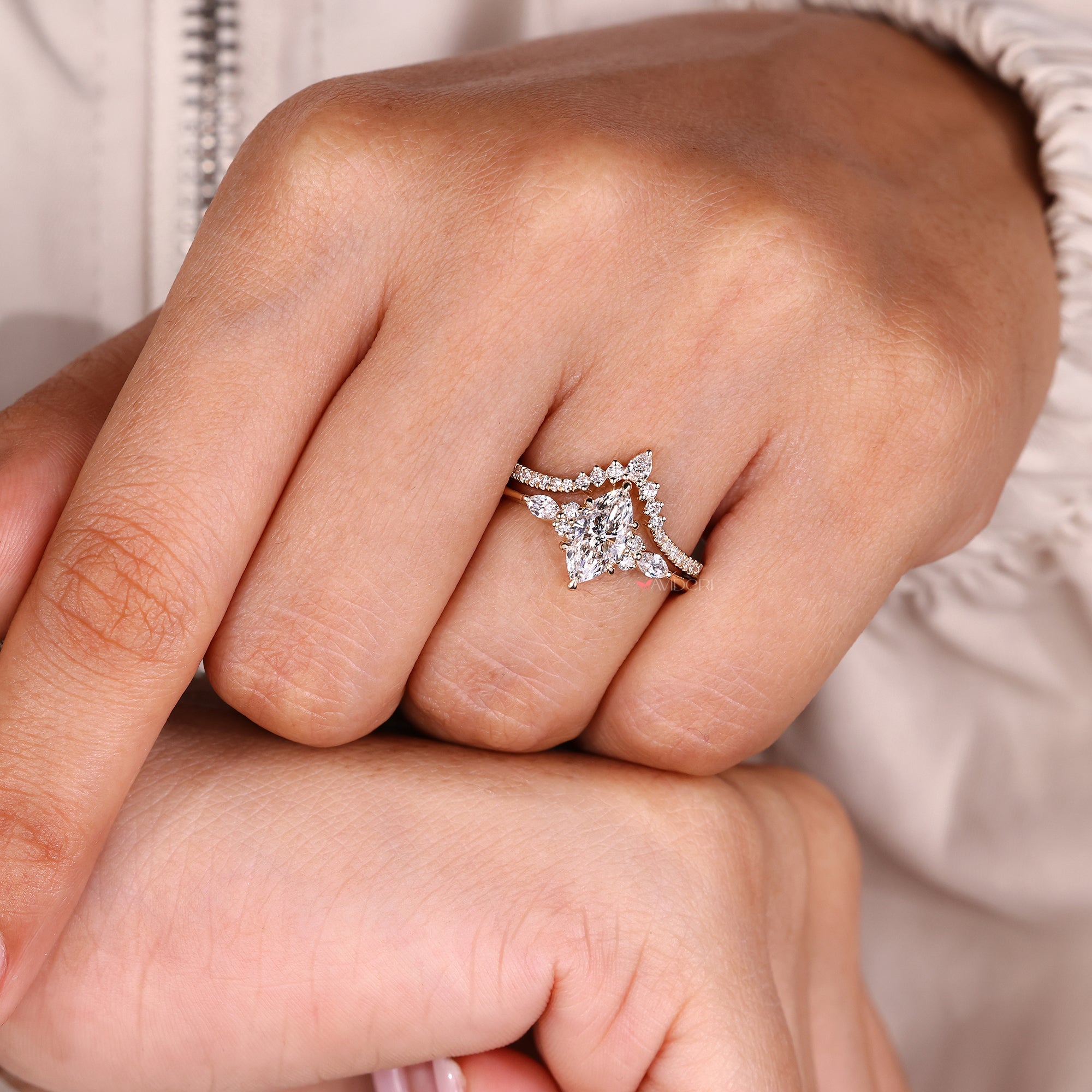 Custom bridal set with a pear cut diamond band.