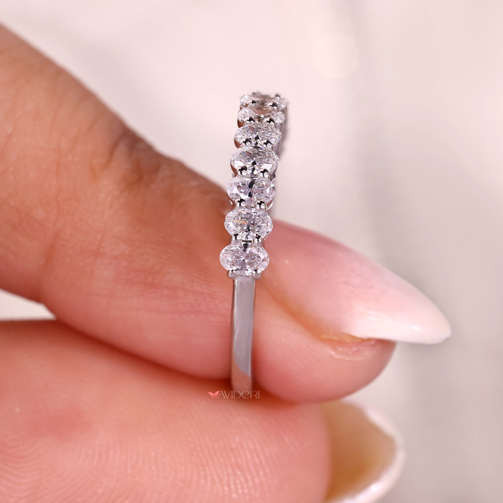 Half eternity band featuring lab grown diamonds.
