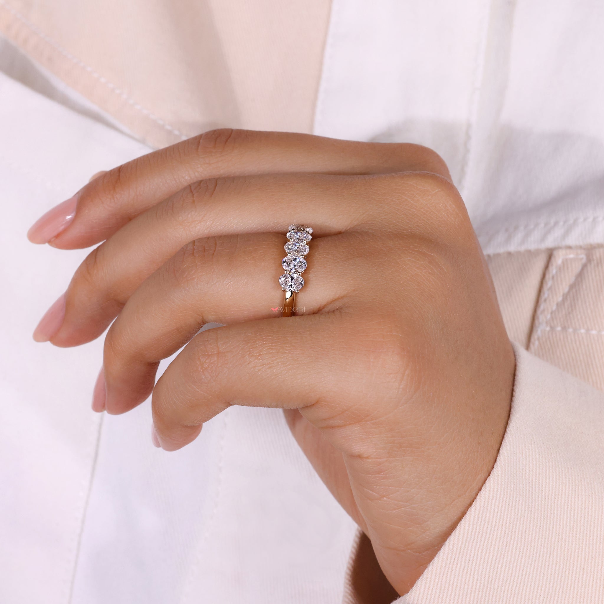 Yellow gold prong set band from Avideri.