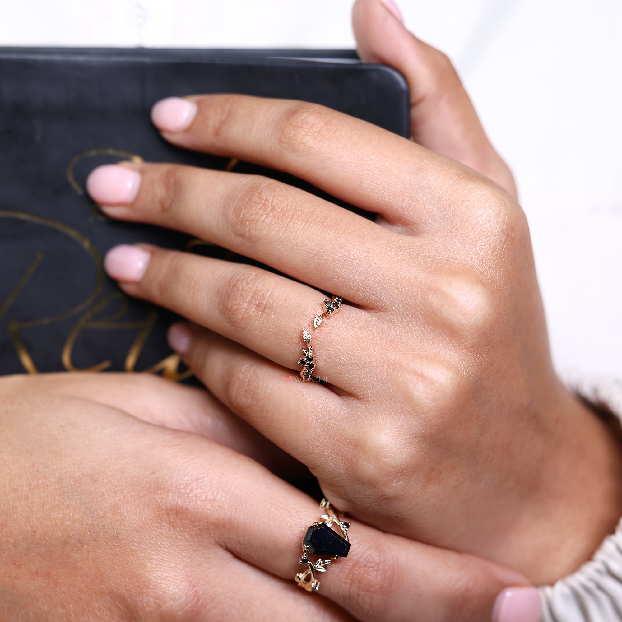 Stackable black moissanite wedding band with handmade yellow gold design.