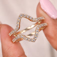 Round diamond wedding band in yellow gold.