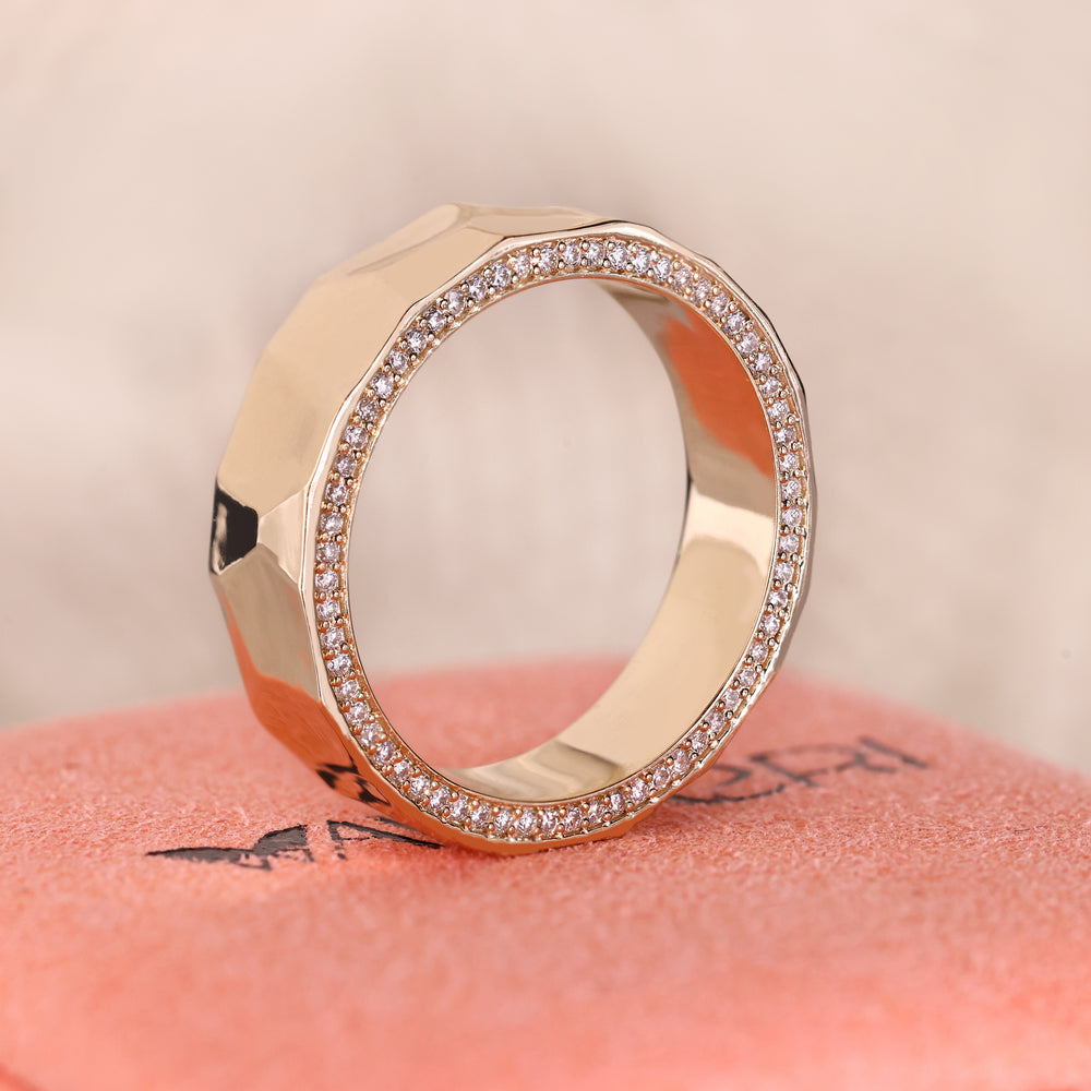 ammered finish wedding band with round double side diamonds.
