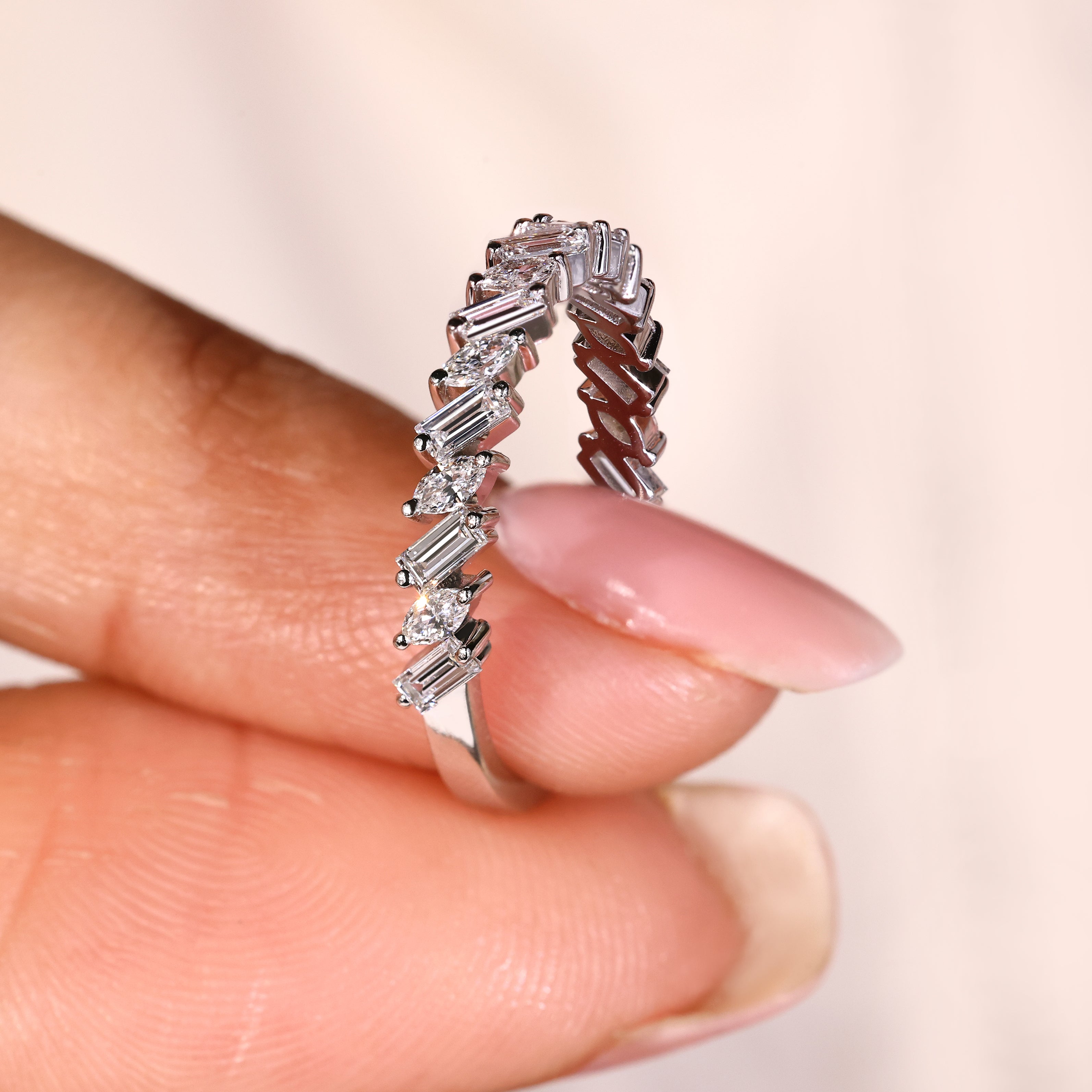 Lab grown diamond wedding band with marquise and baguette stones
