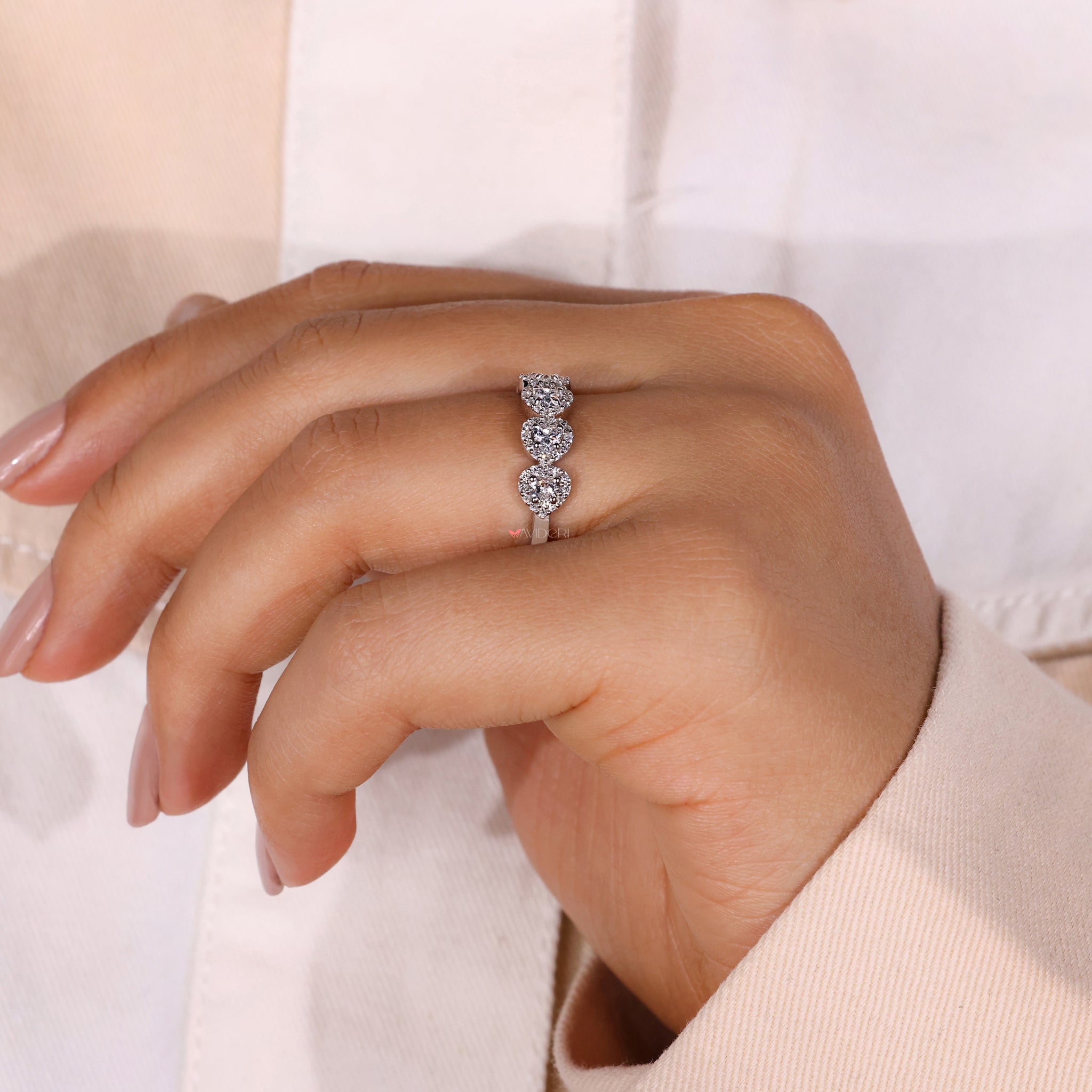 Prong set wedding band with secure diamond placement.
