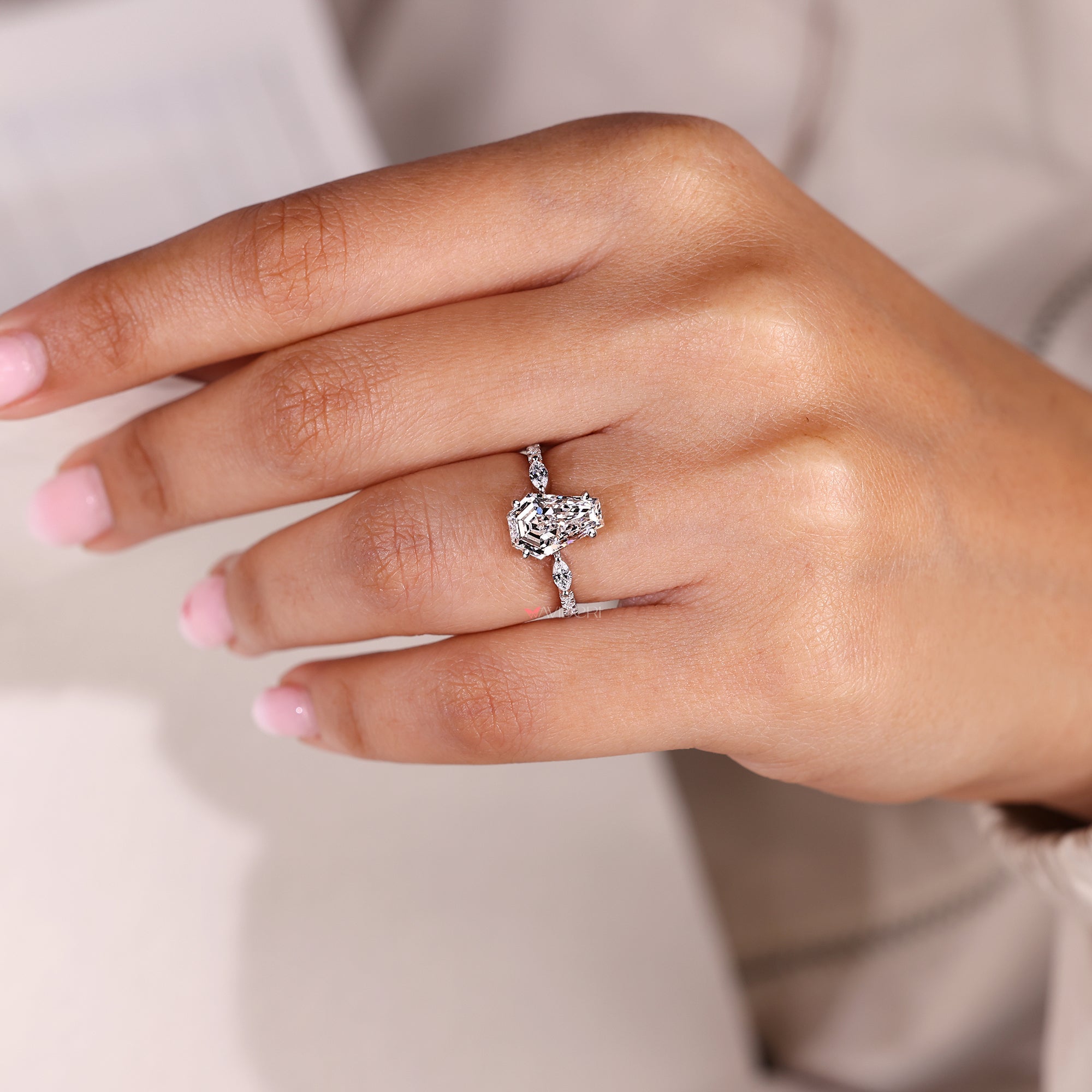 Coffin cut lab grown diamond ring with pave band.