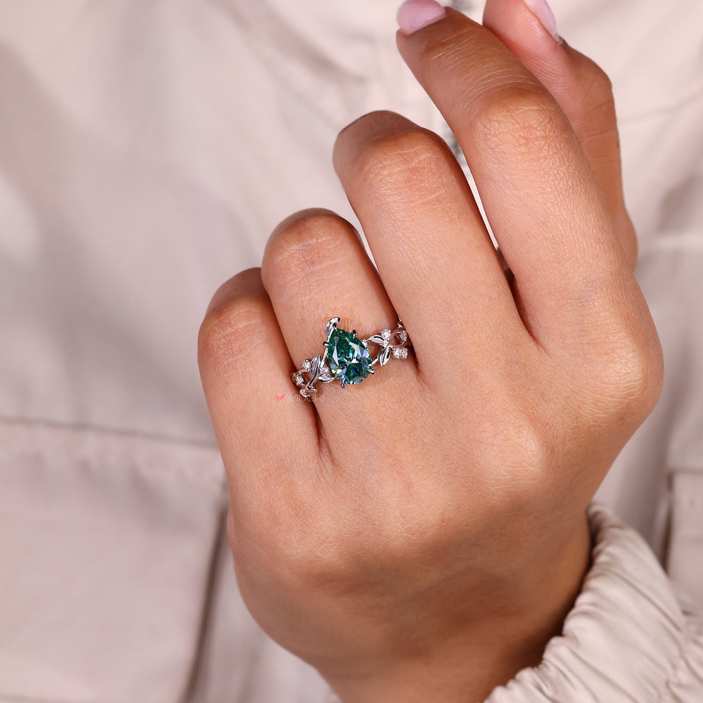 Pear Cut Cyan Blue Moissanite Ring