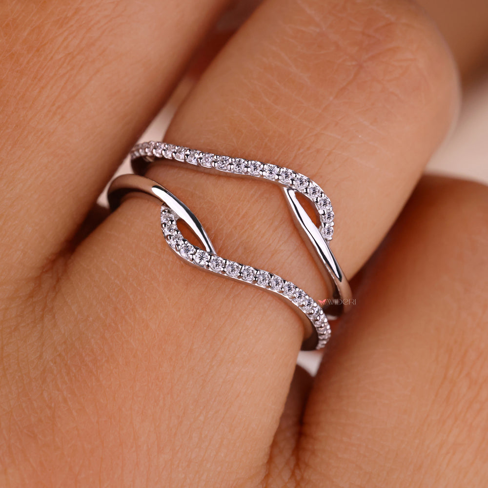 Prong setting band with secure diamond placement.
