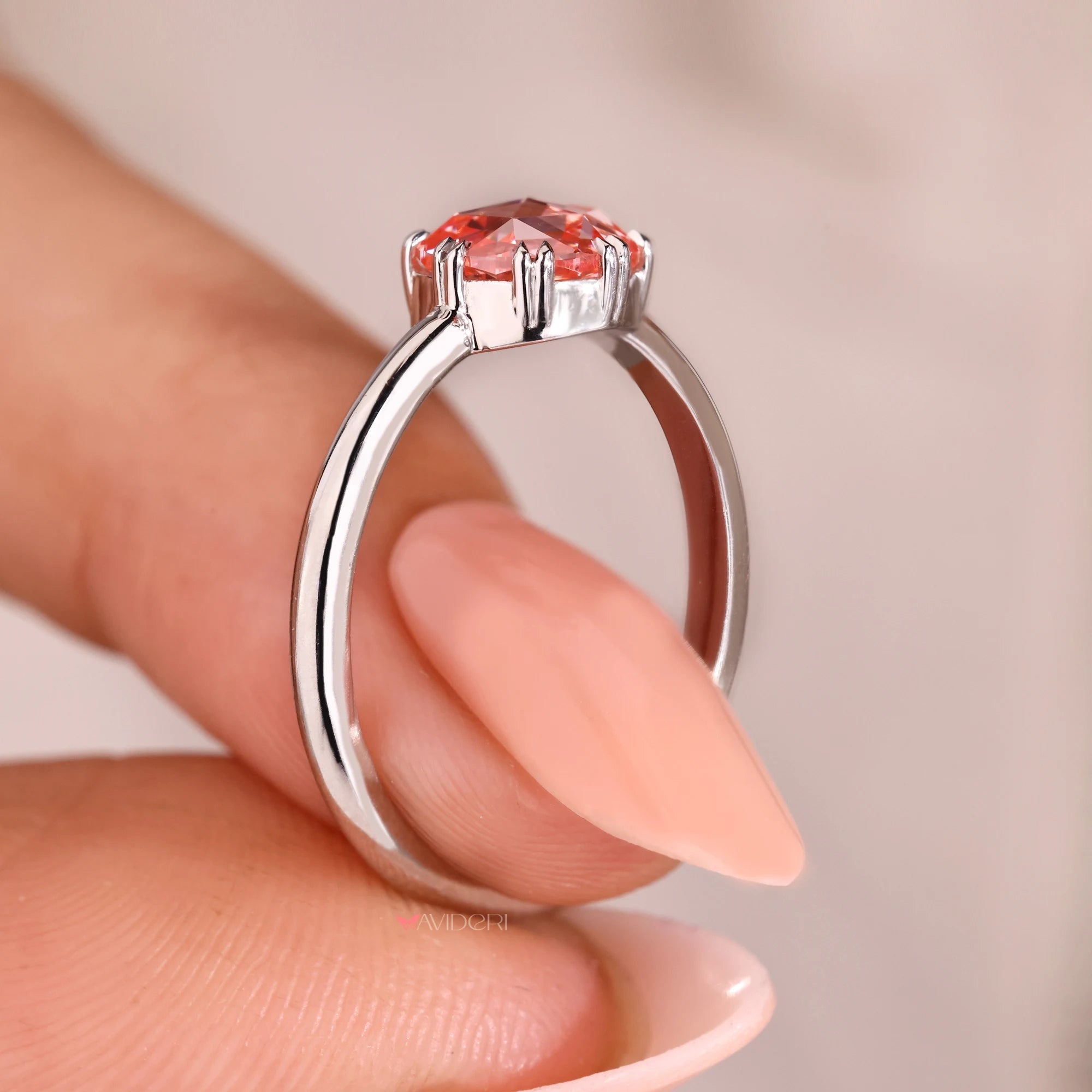 White gold engagement ring with lab-grown diamond ring.