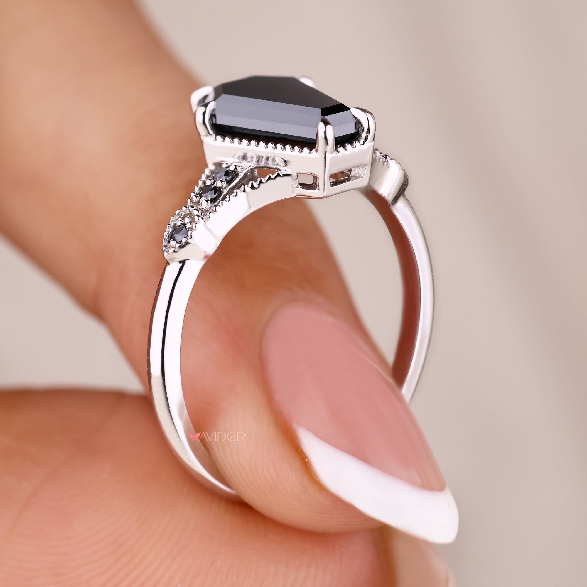 7 stone ring with 6 claw prong setting.