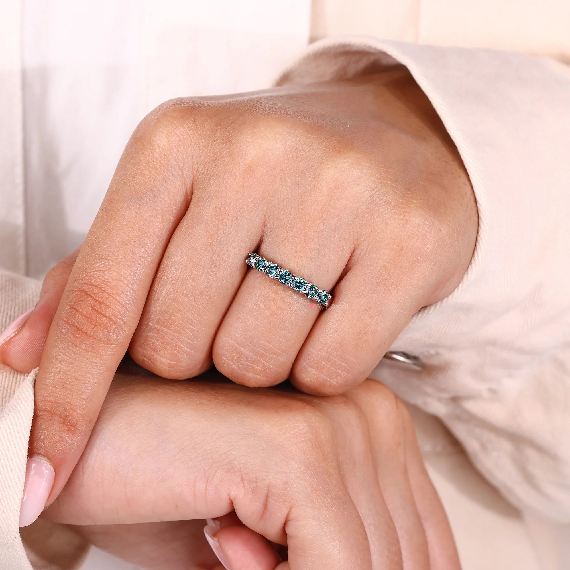 Cyan blue wedding band with moissanite wedding band.
