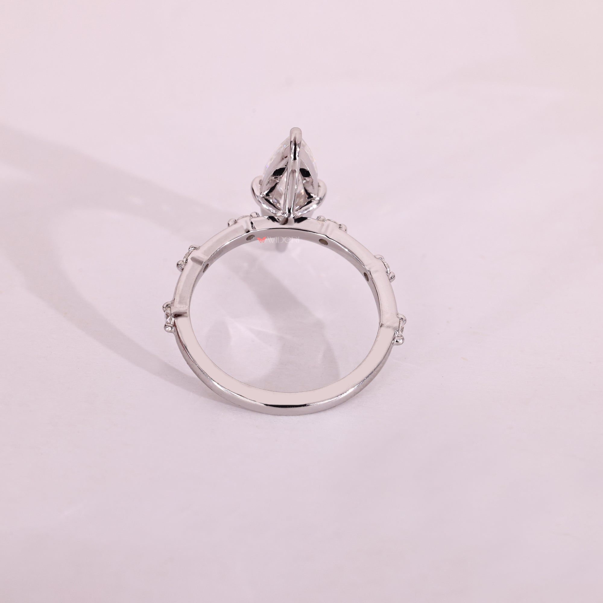 A white gold ring that blends traditional tones with modern elegance in fine jewelry.