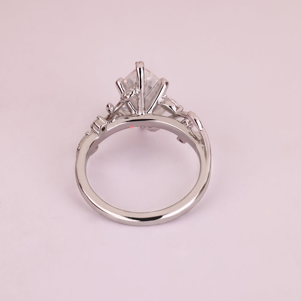 White gold engagement ring with handmade ring.