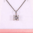 Solitaire diamond pendant with Asscher cut diamond pendant.