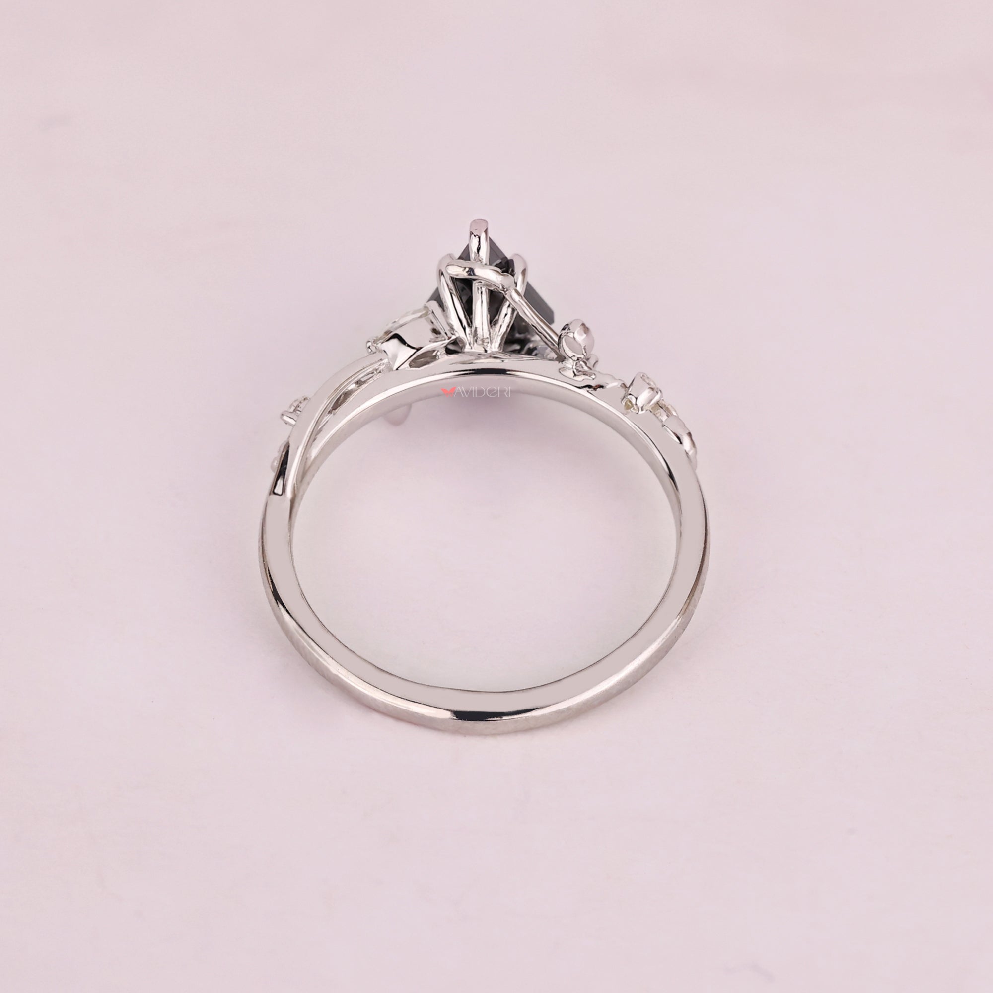 White gold ring with custom engagement ring design.