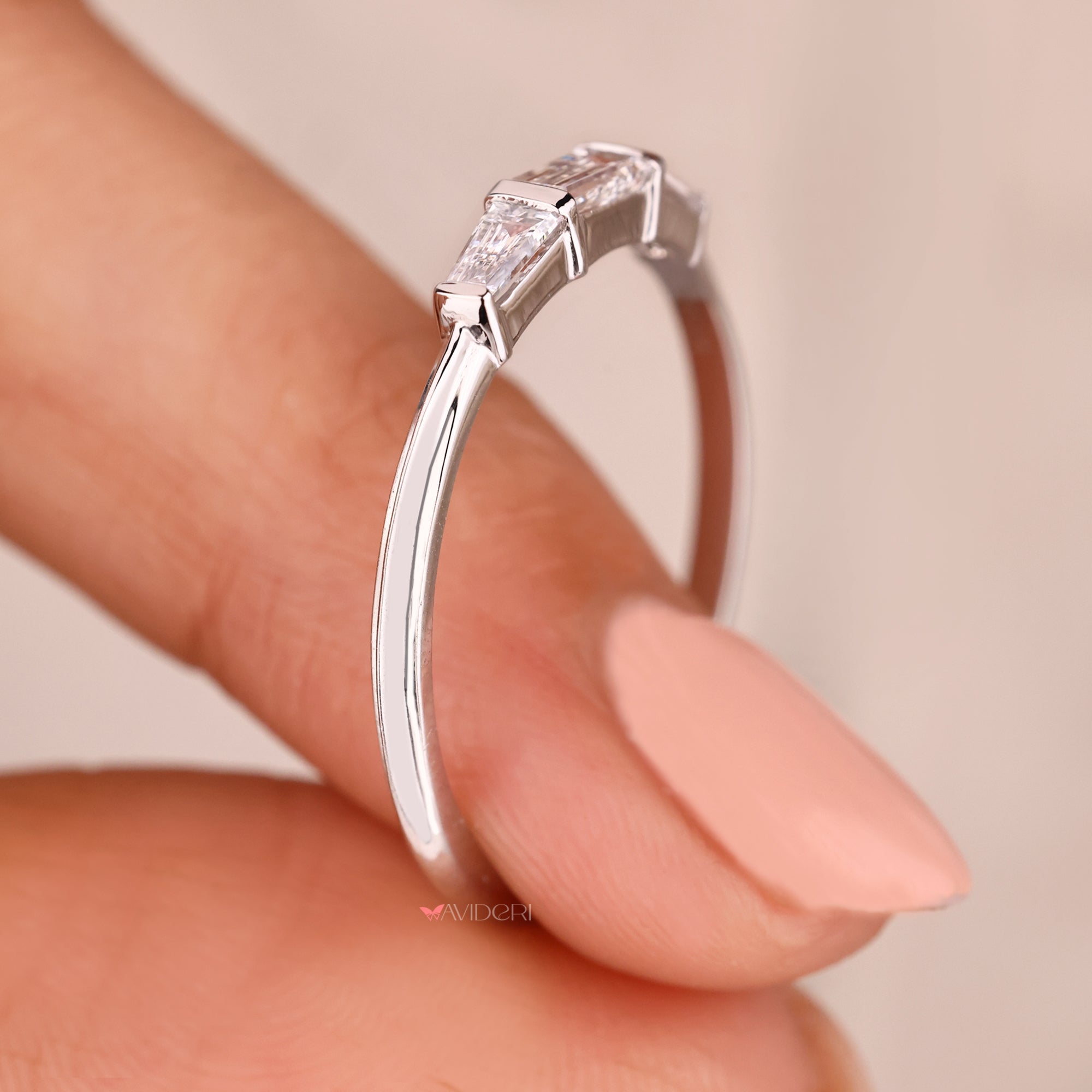 Handmade jewelry with avideri wedding band.