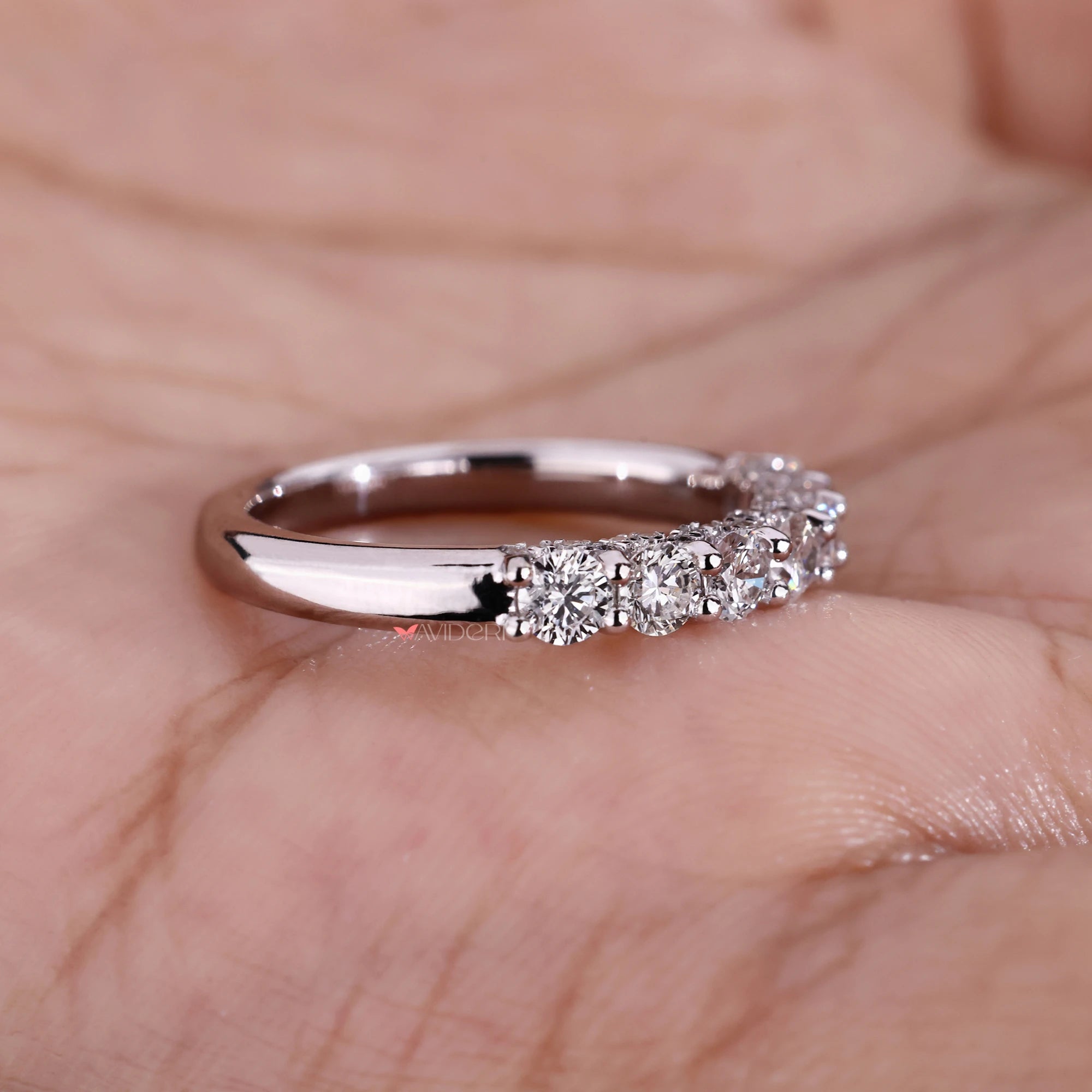 Half eternity band with round diamond wedding band.