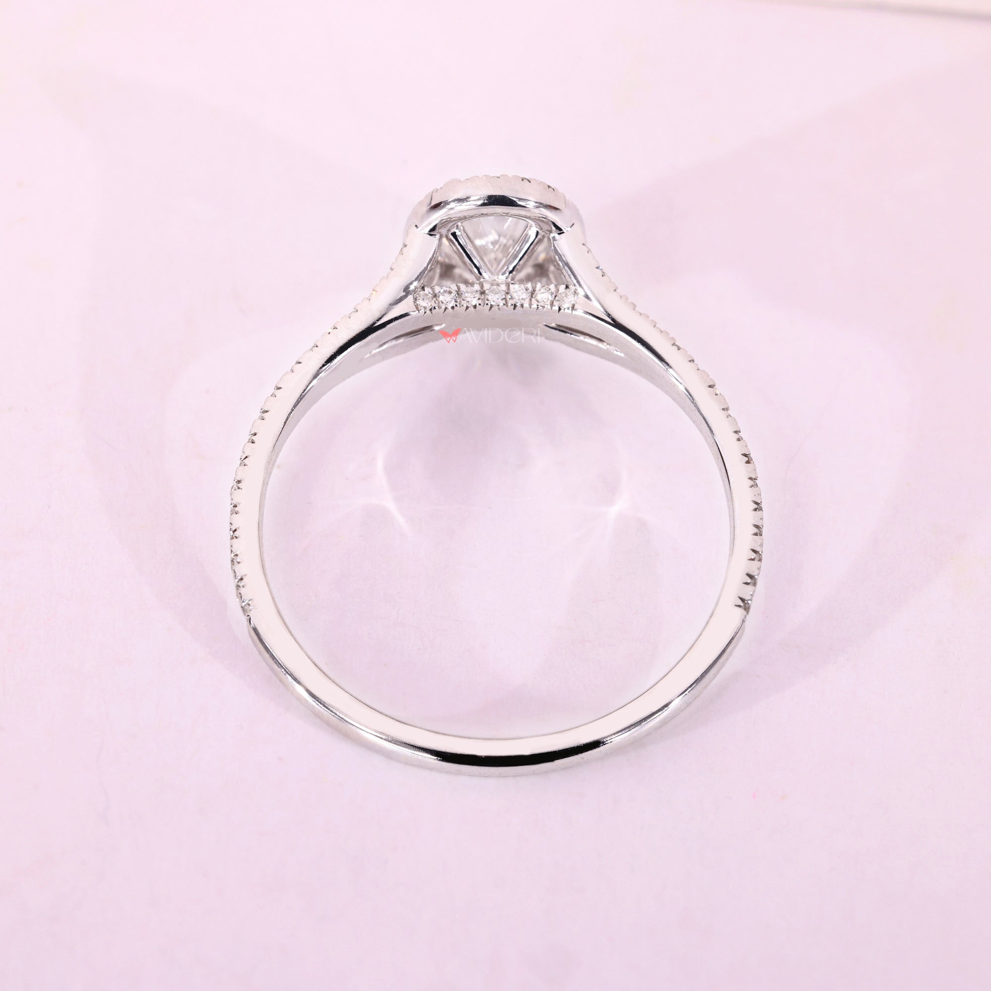 Bridge accent ring with round diamond ring.