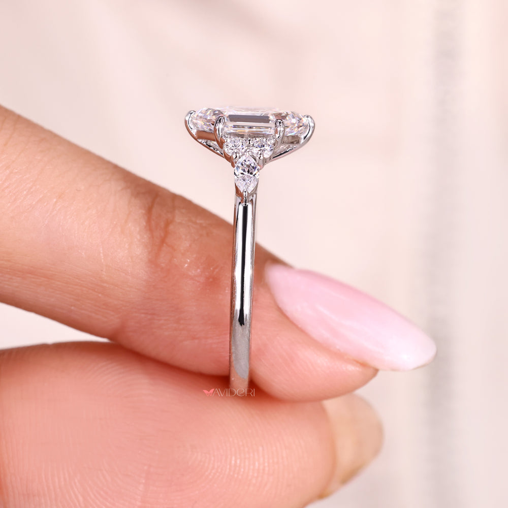 Muse setting seven stone ring with hexagon center diamond.
