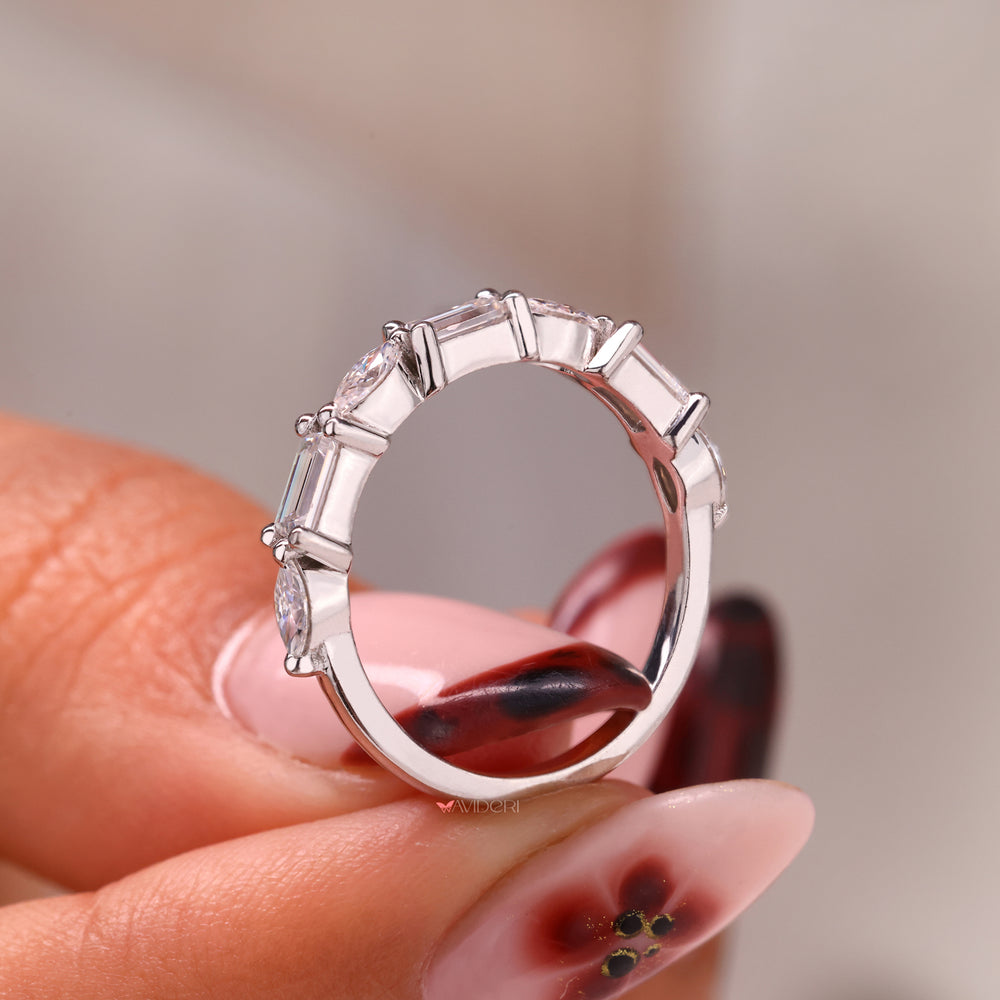Marquise cut wedding band in white gold.
