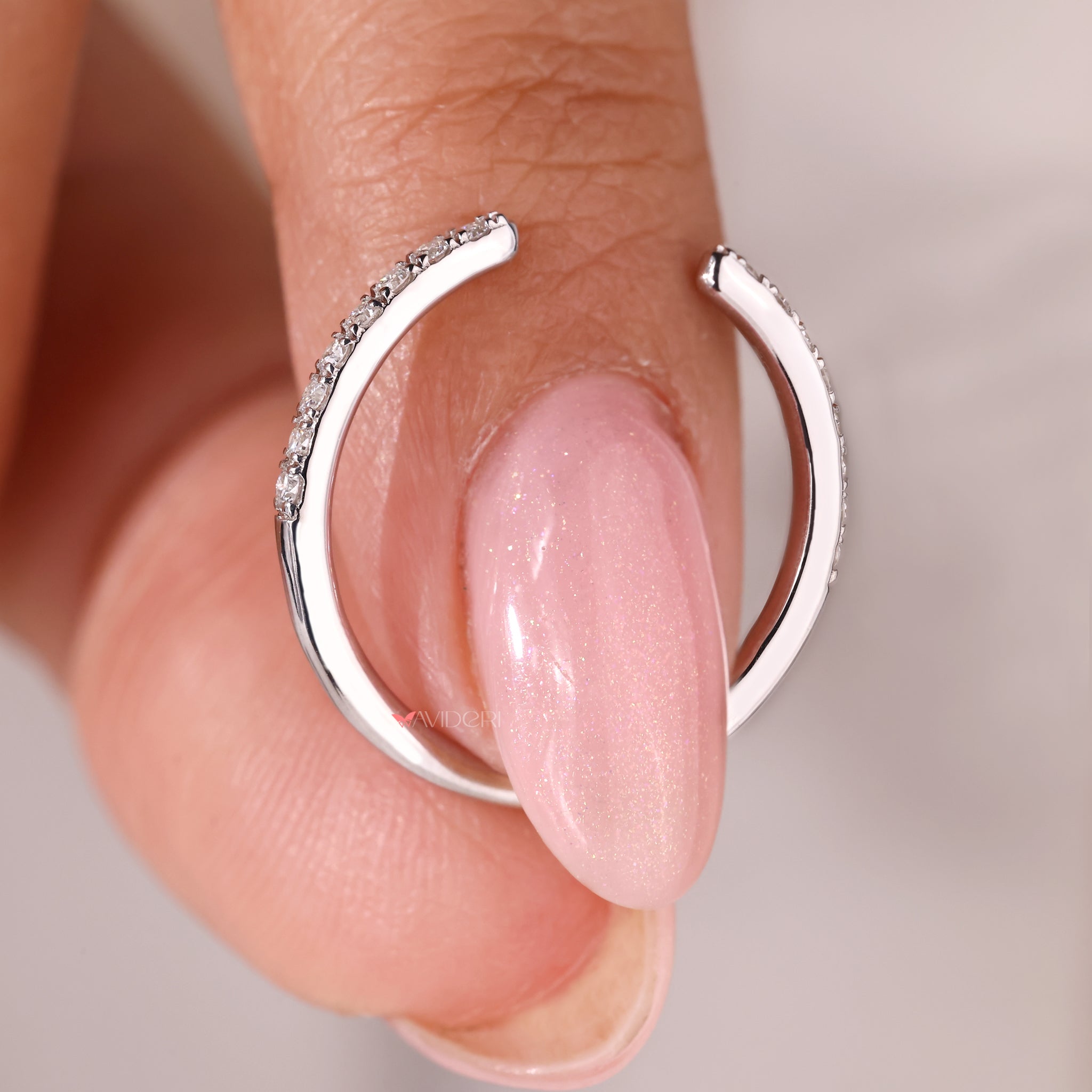 White gold wedding band with half eternity style.