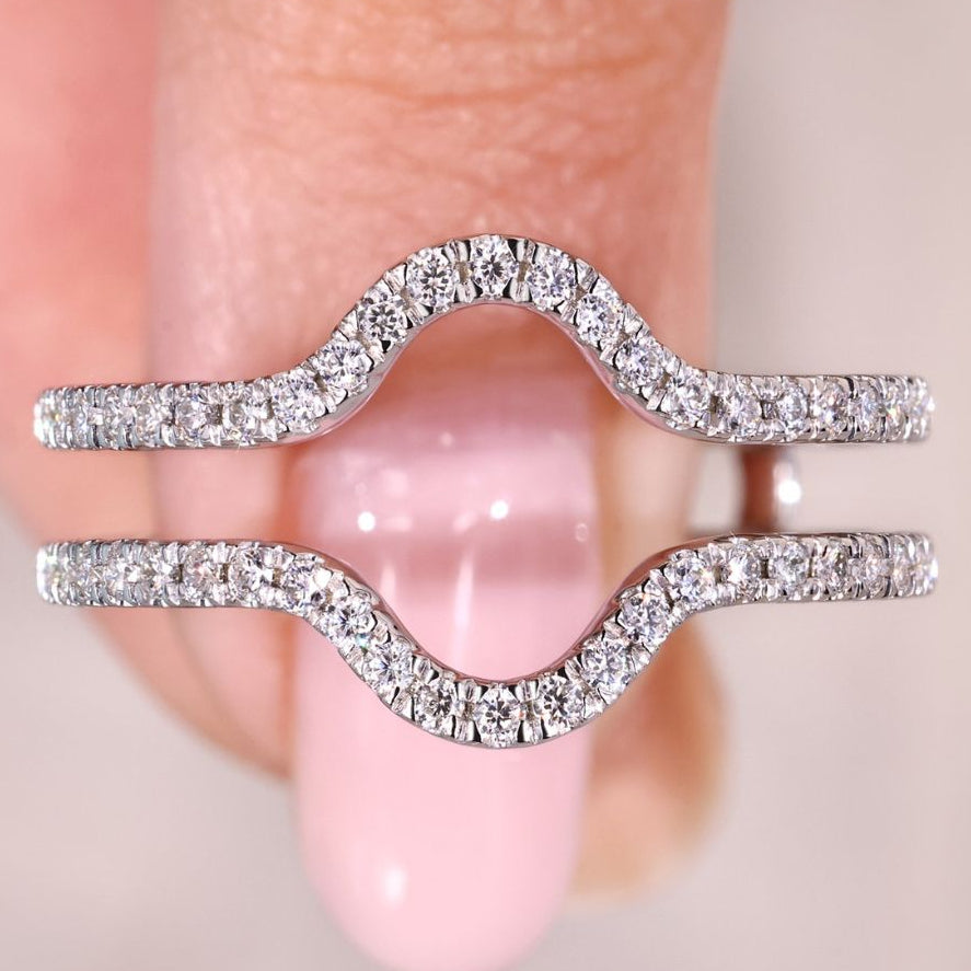 Ring enhancer wedding band with round diamonds.
