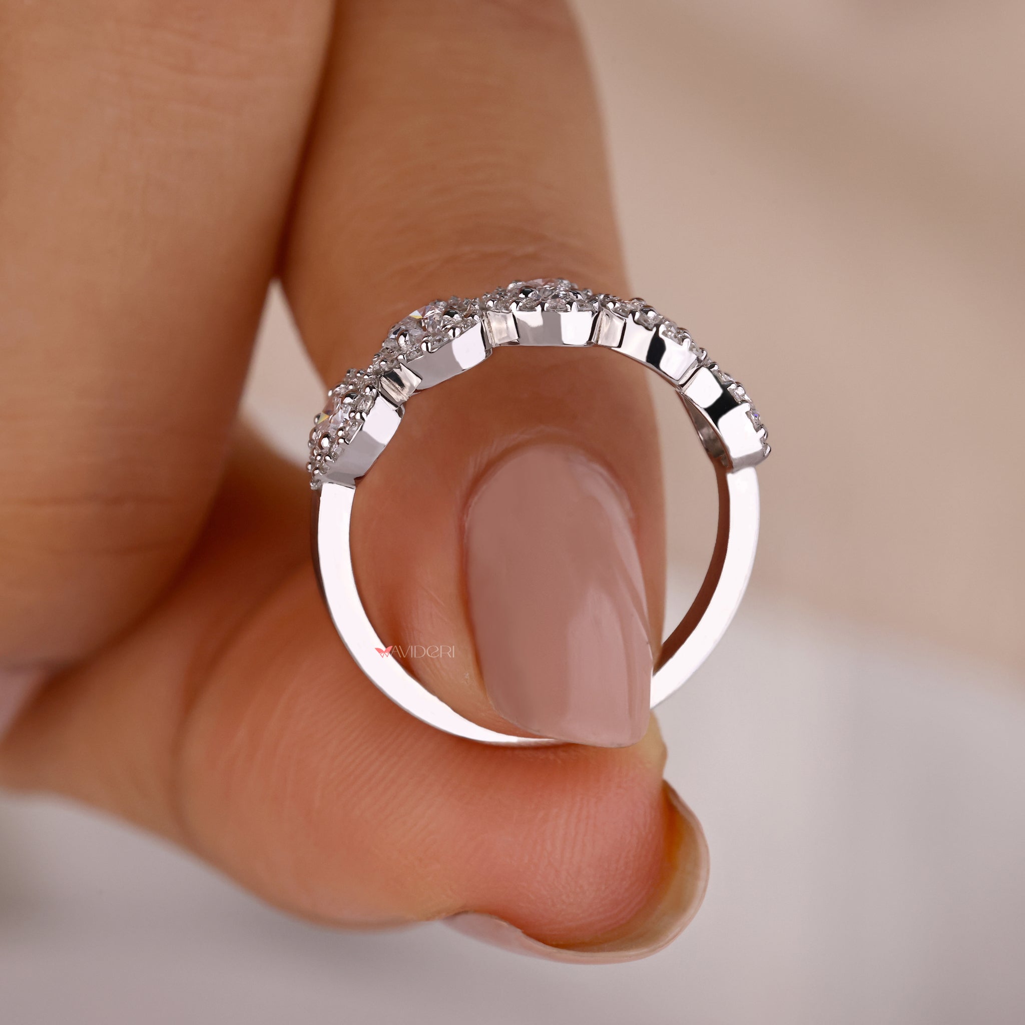 White gold diamond band with a polished shine.
