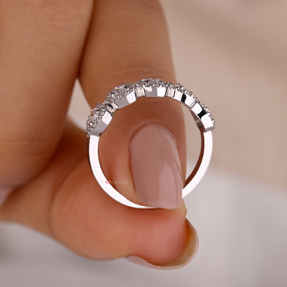 White gold diamond band with a polished shine.
