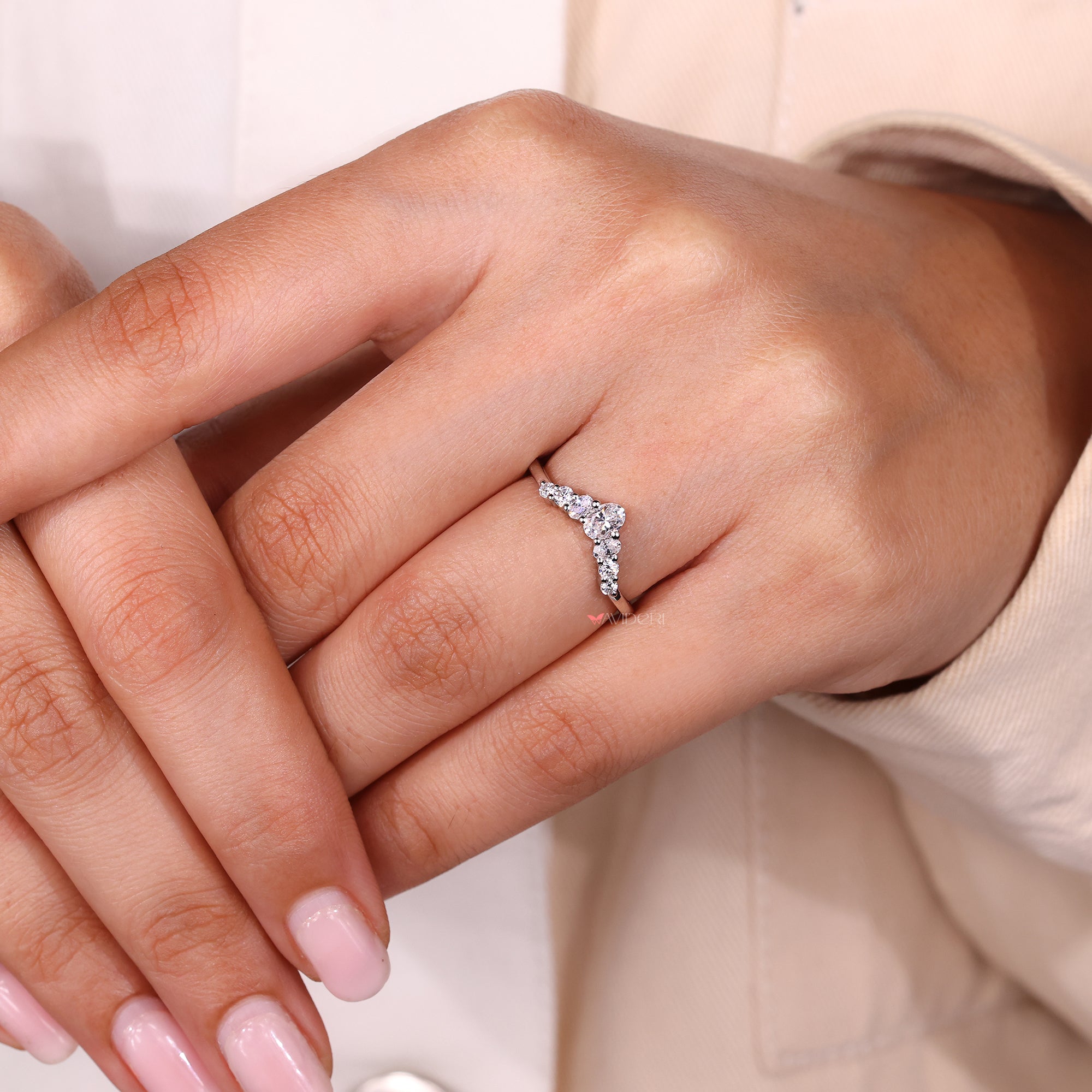 Round side stone band with curvy wedding band.