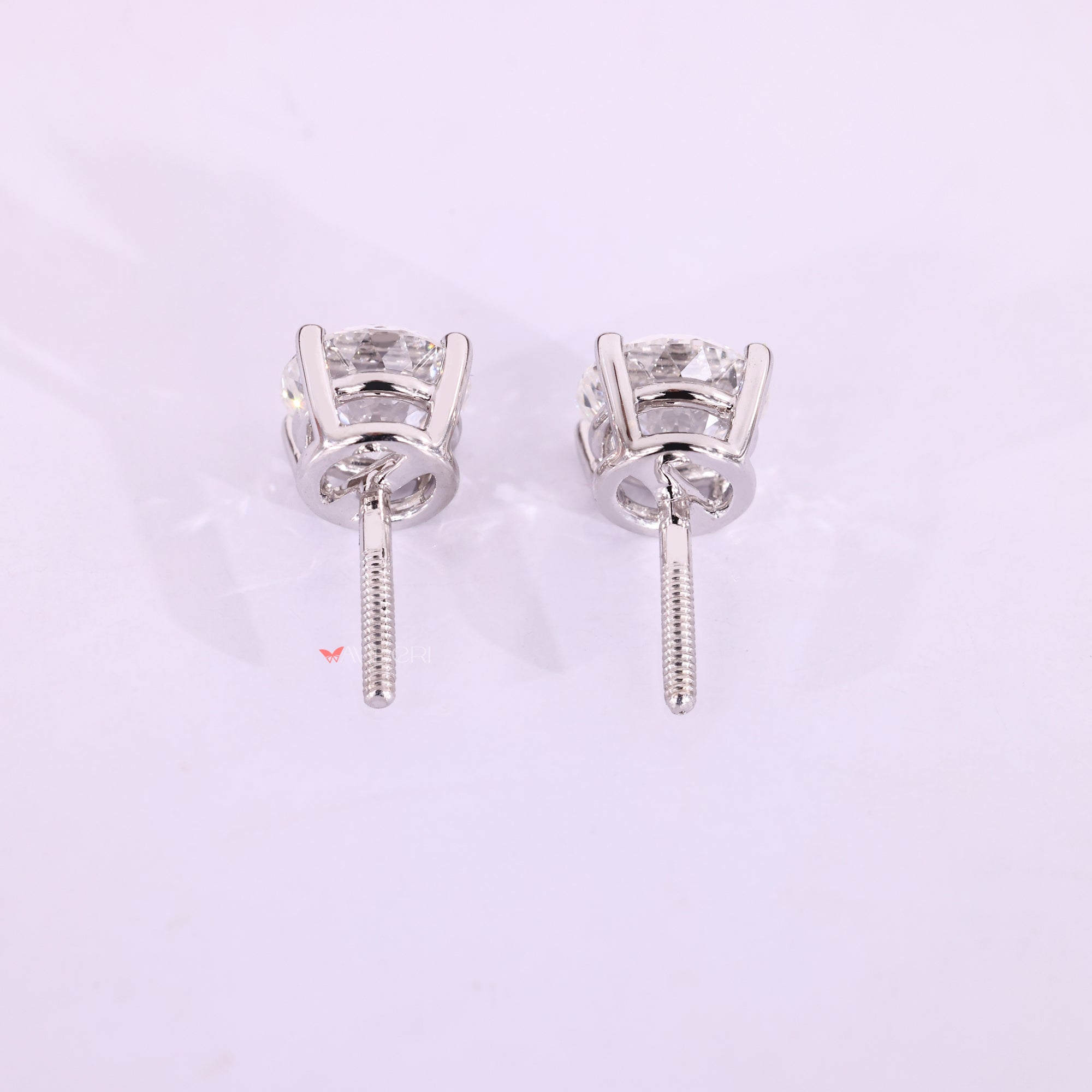 Handmade Portuguese cut diamond stud earrings.