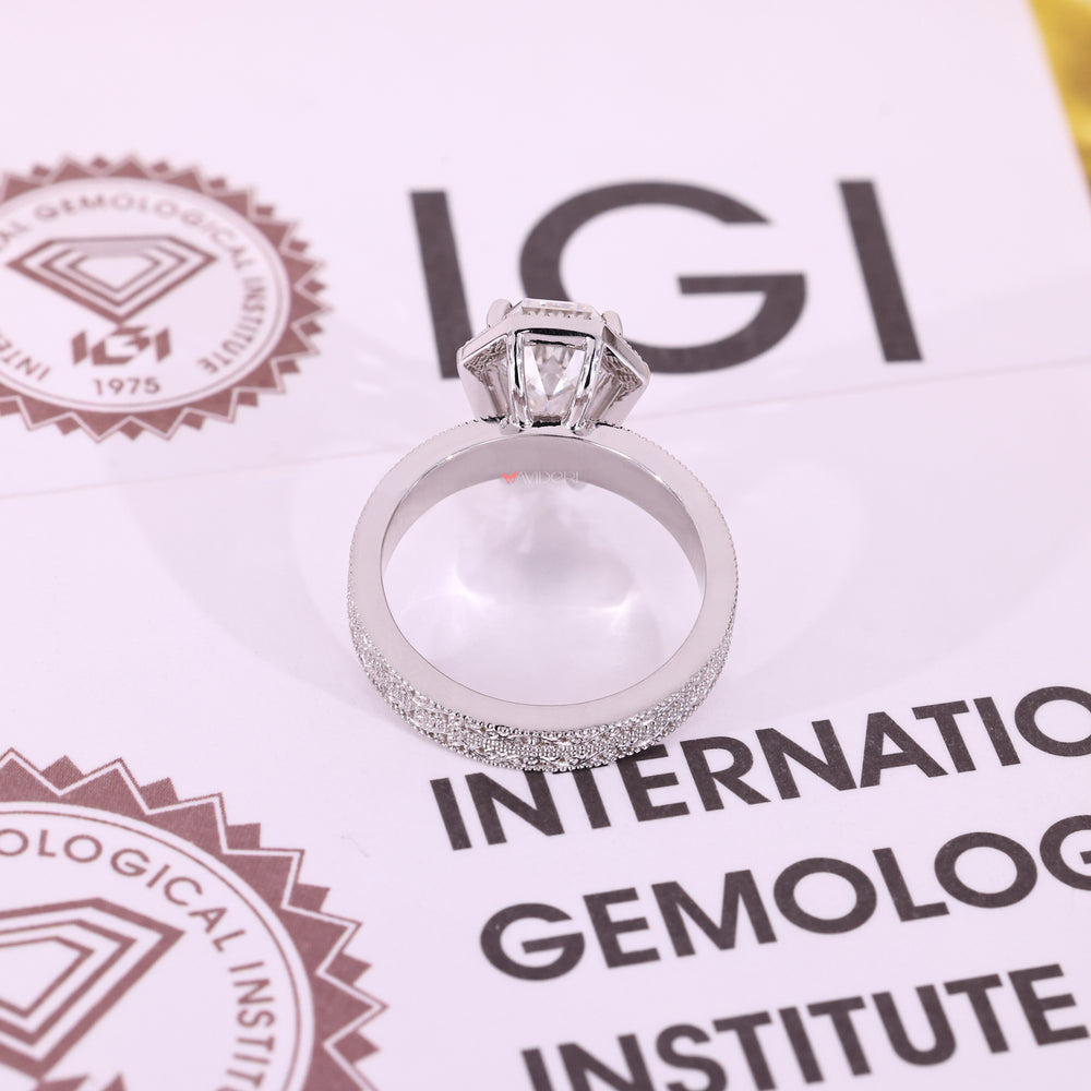 White gold engagement ring with milgrain setting ring.