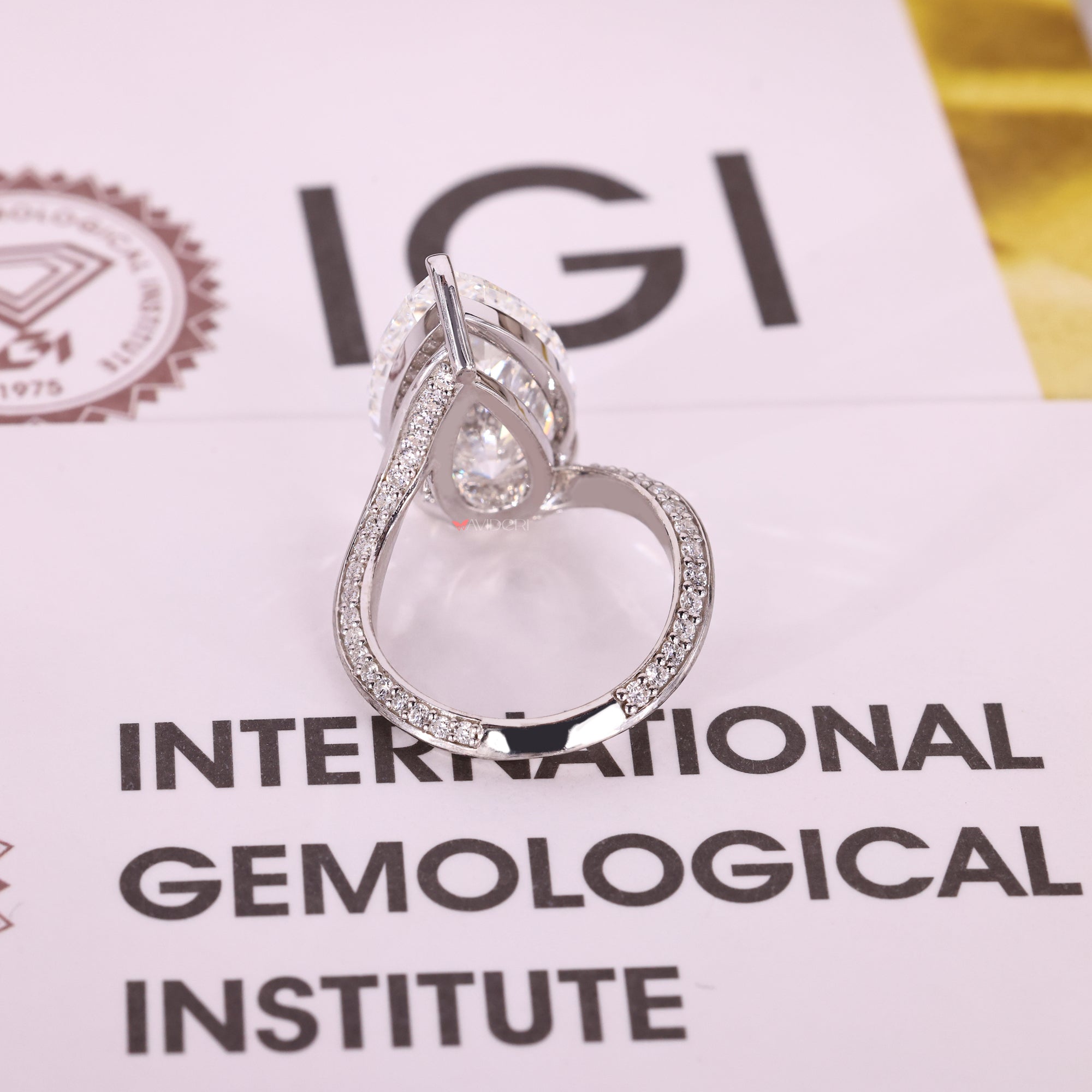 White gold engagement ring with lab-grown diamond ring.