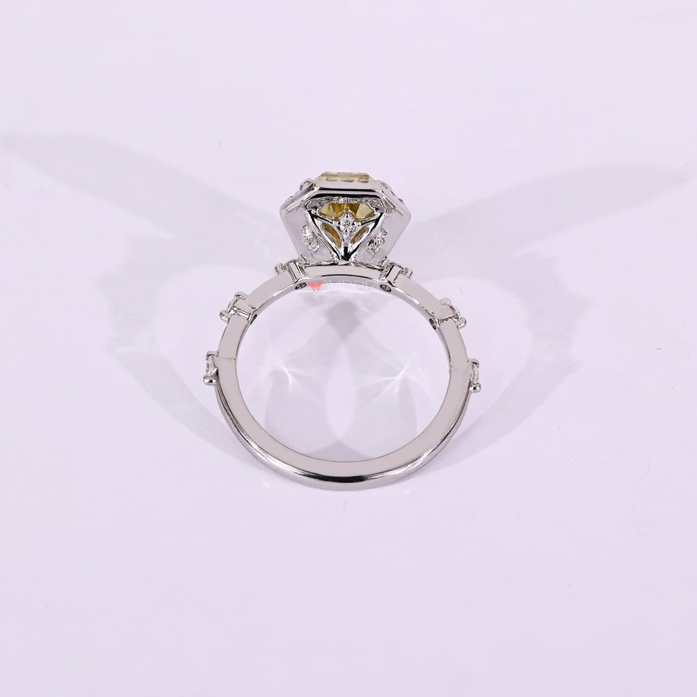 White gold engagement ring with four claw prong.