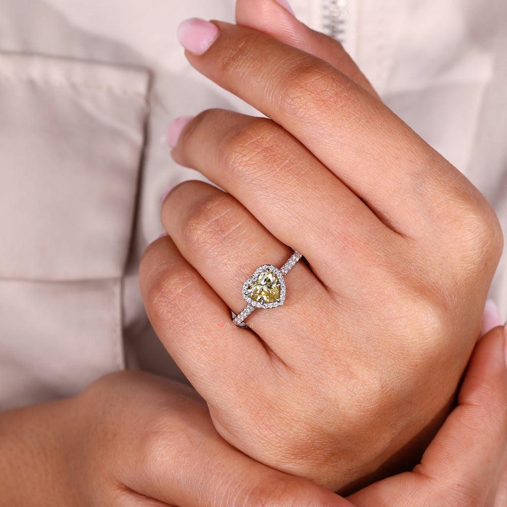 Handmade heart cut moissanite ring in halo style.