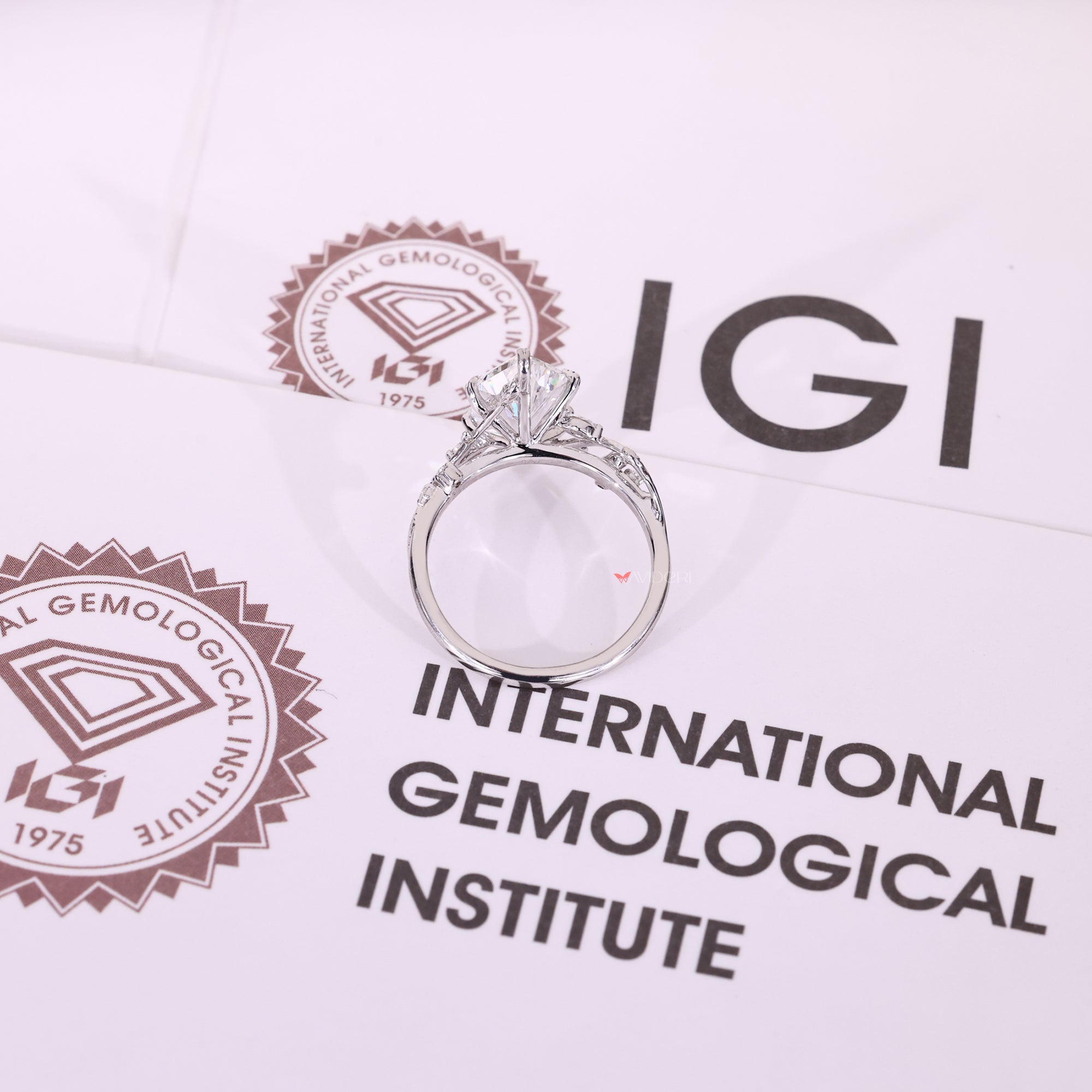 White gold engagement ring with nature inspired engagement ring.
