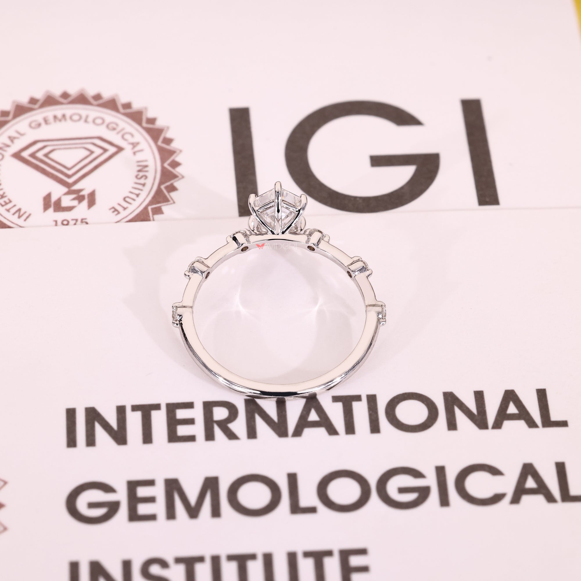 White gold engagement ring with lab-grown diamond ring.