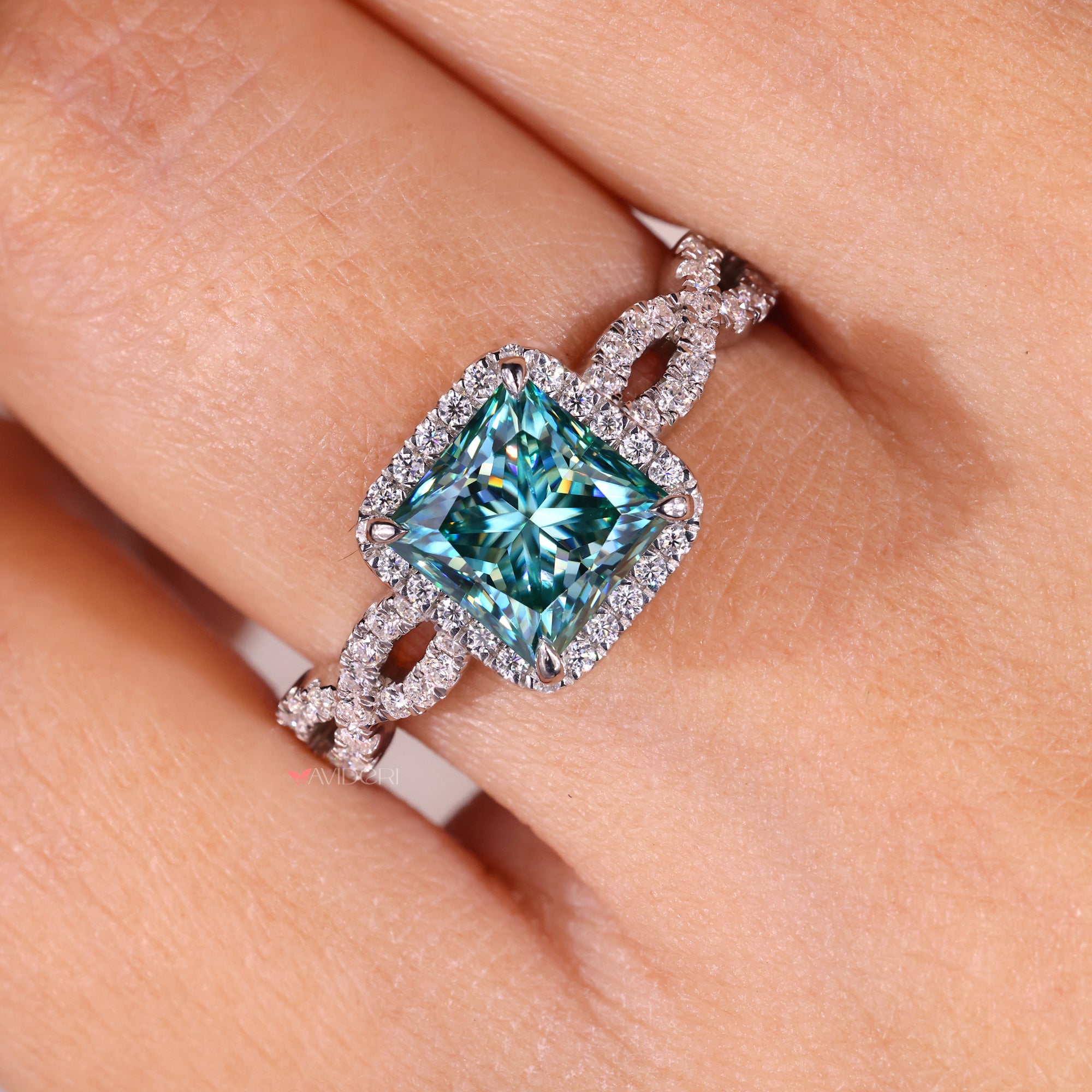 Round princess cut engagement ring with a dazzling center stone.
